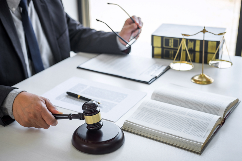 lawyer working on documents in courtroom