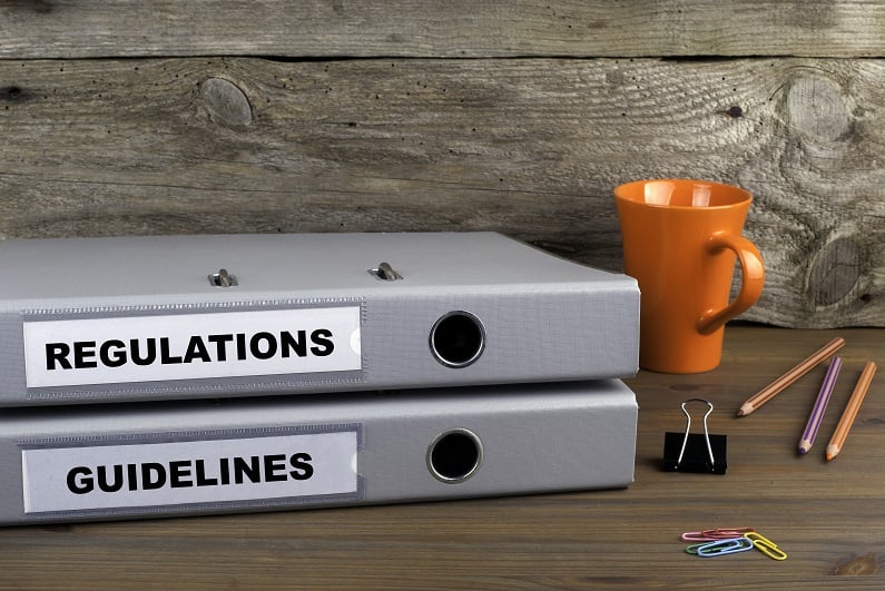 two folders on wooden office desk