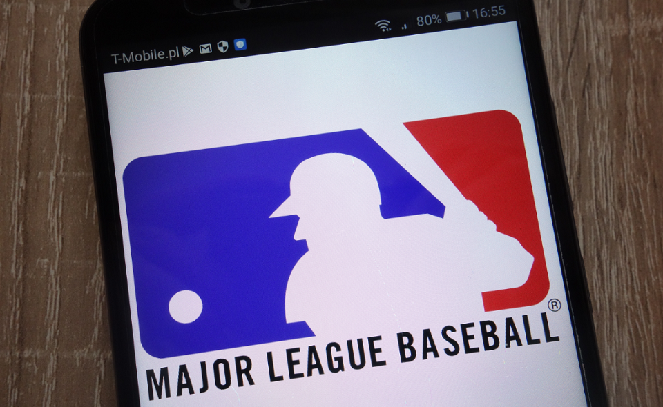 MLB logo displayed on a modern smartphone