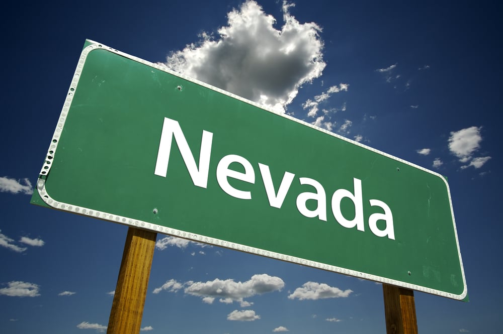 Nevada road sign against blue sky backdrop