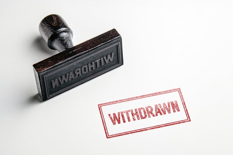 Rubber stamp reading "WITHDRAWN"